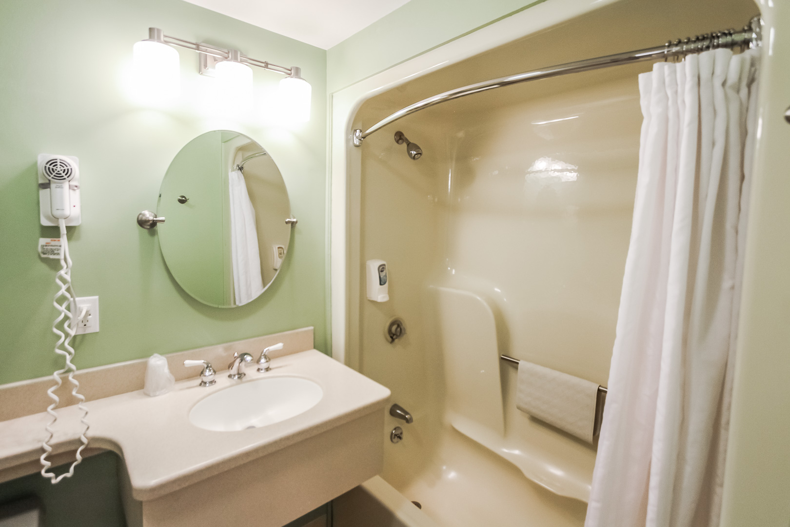 A spacious bathroom at VRI's Holly Tree Resort in Massachusetts.
